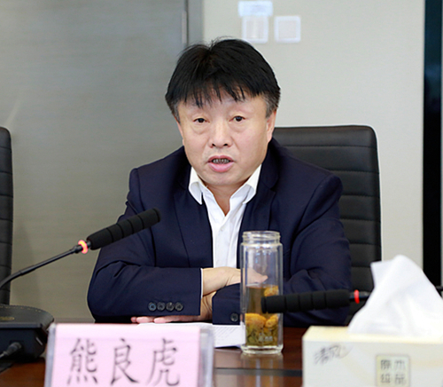 熊良虎会见陕西地电（集团）公司党委书记、、董事长邹满绪