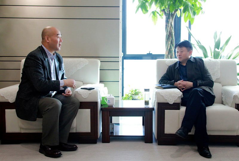 熊良虎会见华彩咨询公司董事长、总裁白万纲